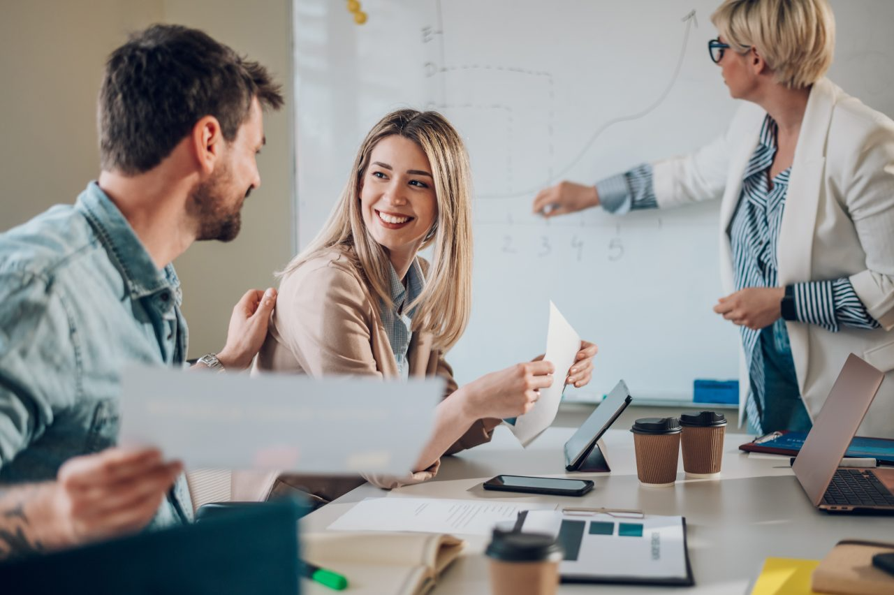 imgi_9_multiracial-business-team-having-a-meeting-in-the-office-e1694471433378